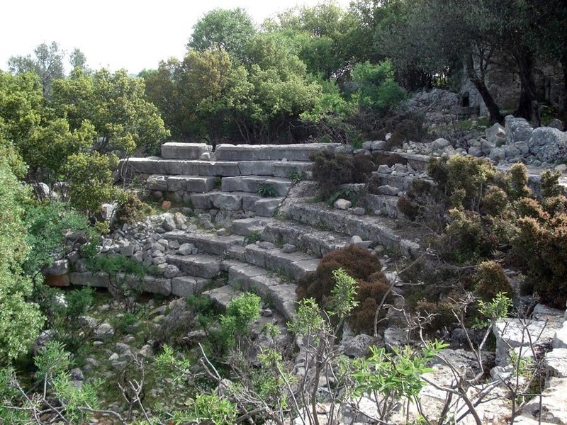 Theater ruins in the Asartepe locality of Apollonia Ancient City and Sahil Kılınçlı Village.