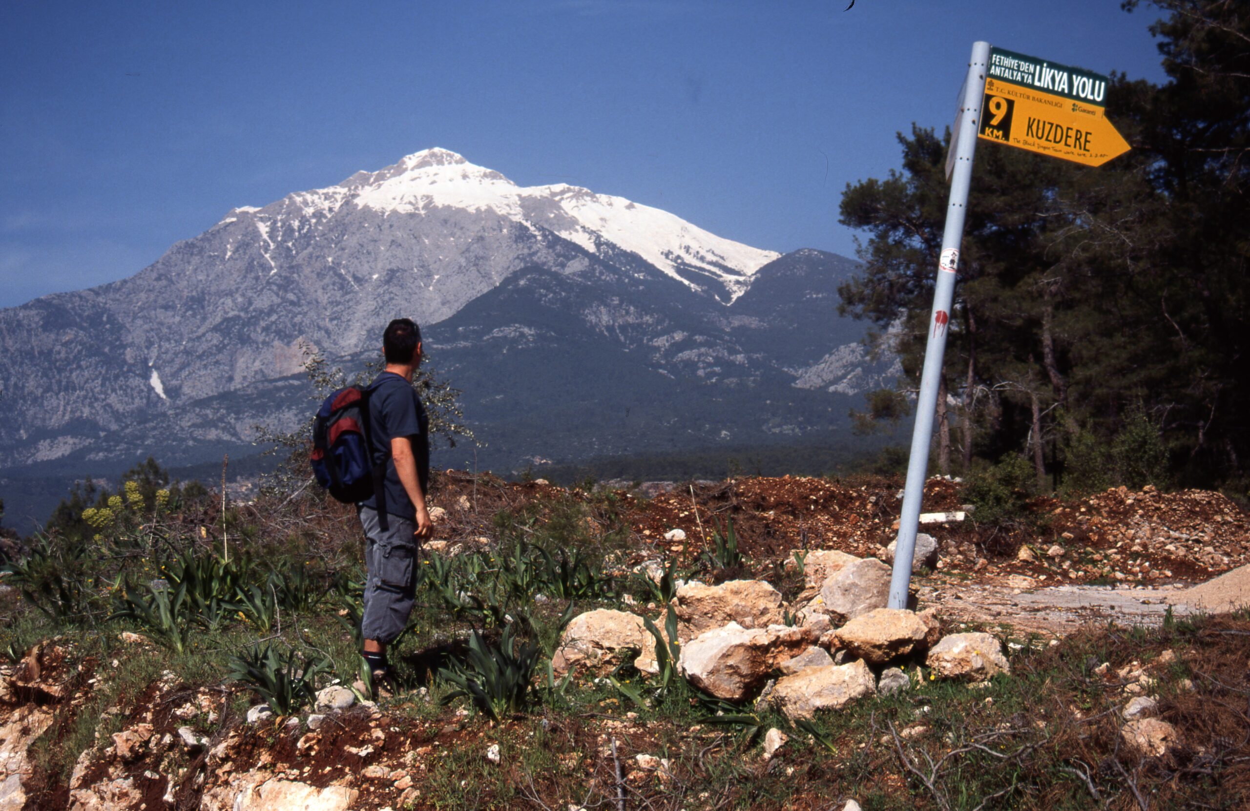 Lycian Way starting point sign and Ersin Demirel's hiking stages.

