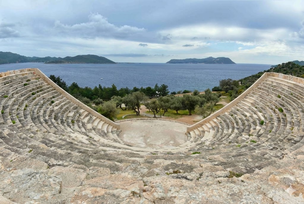 General view of the Antiphellos Ancient City theater and the Kaş-Meis Island landscape.