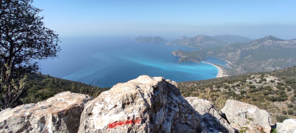 The red-and-white waymarks of the Lycian Way and the Mediterranean.