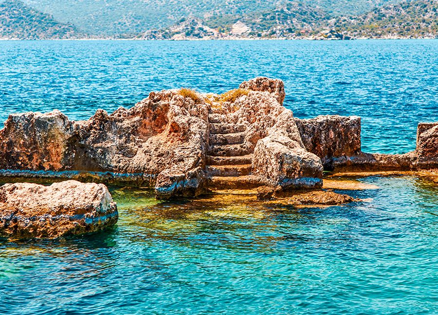 The ruins of the Sunken City of Kekova and ancient remains submerged as a result of Lycian Geology and Earthquakes.