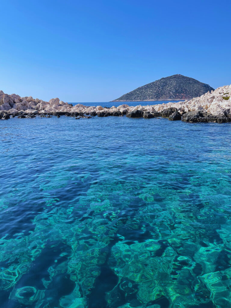 The Lycian Coast: turquoise coves, boats and coastline.
